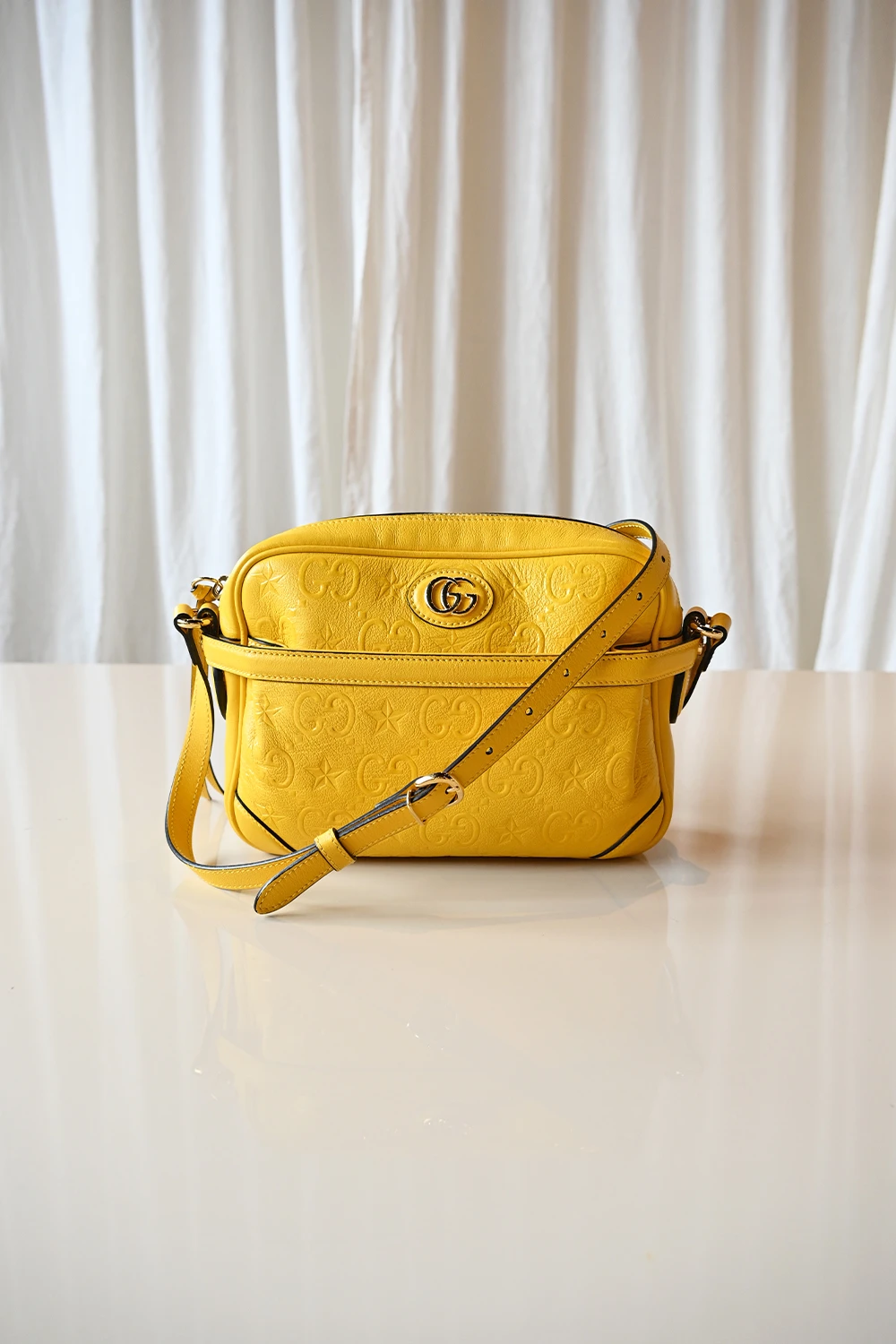 Gucci GG interlocking star camera bag | Yellow